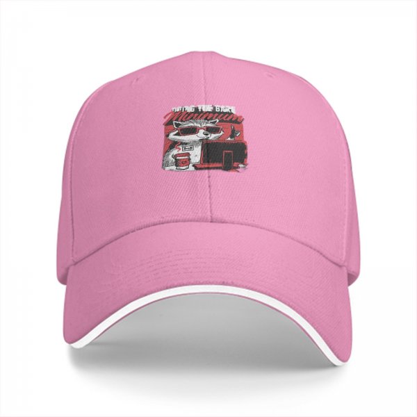 Black baseball cap with raccoon graphic doing the bare minimum