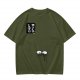 Olive green graphic t-shirt with cute eye design and Japanese text print