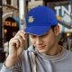 Black baseball cap with chihuahua in teacup graphic design
