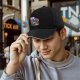 Black Baseball Cap With Cobra Puffs Graphic Print