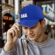 Black baseball cap with three stylized hamster graphic print
