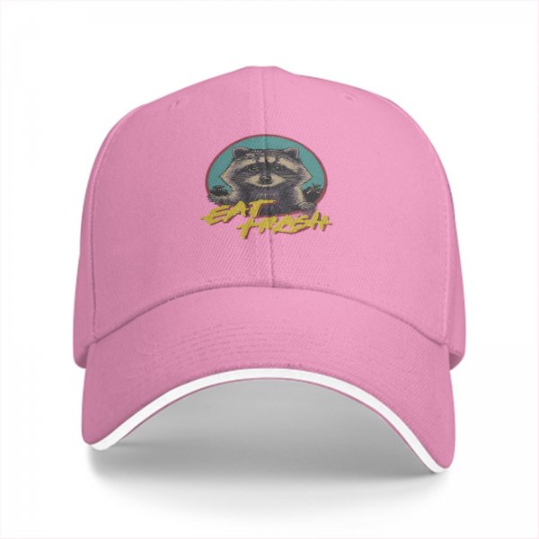 Black baseball cap with raccoon graphic and 'Eat Trash' text