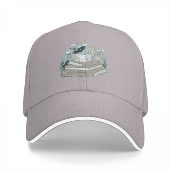 Black baseball cap with teacup on books and botanical print