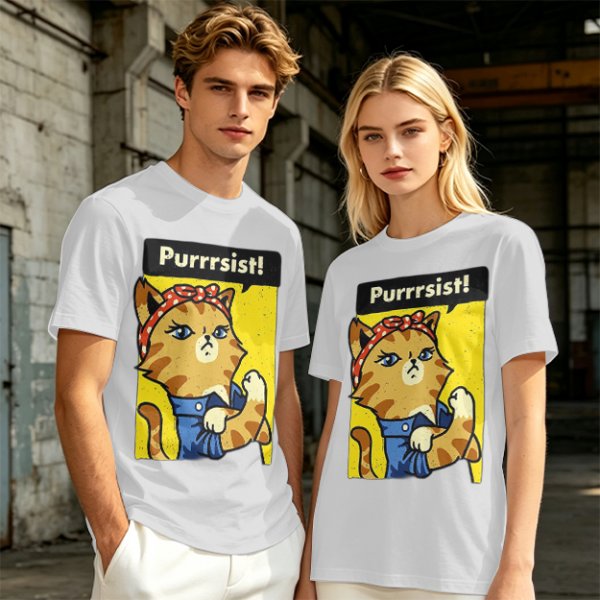 Olive green t-shirt with a cat in a Rosie the Riveter pose and 'Purrrsist!' text