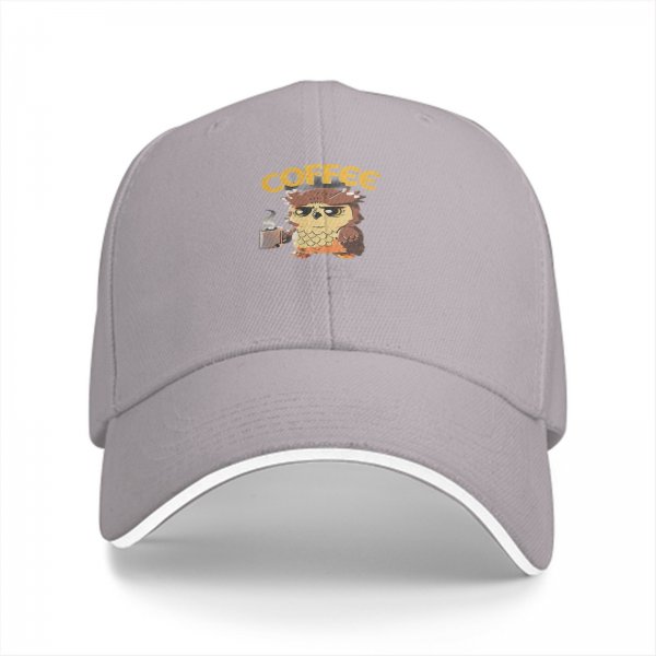 Black baseball cap with grumpy owl holding coffee and 'COFFEE' text