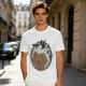 Olive T-shirt with a terrified gingerbread man and flying birds graphic