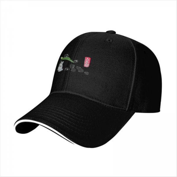 Black baseball cap with small forest spirit and soot sprite graphic