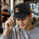 Black baseball cap with 'Leftovers Are For Quitters' cat graphic