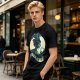 Olive Witch Graphic T-Shirt With Winged Monkey And Crystal Ball