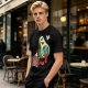 Olive T-Shirt with Cartoon Avocado Globe Travel Print
