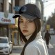 Black baseball cap with blue fantasy character explosion graphic