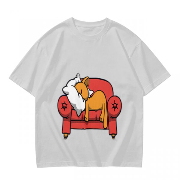 Olive green t-shirt with a sleeping orange cat on a red armchair print