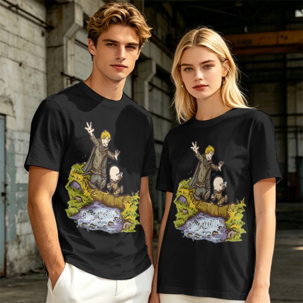 Olive T-shirt with fantasy characters balancing on a log over a stream