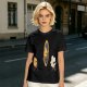 Olive T-Shirt With Cartoon Characters Riding Bikes Through Portal
