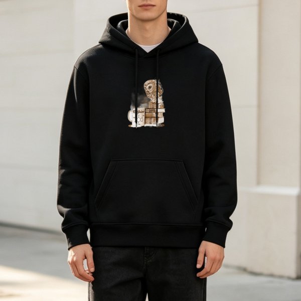 Black hoodie with owl, coffee mug and stacked books graphic