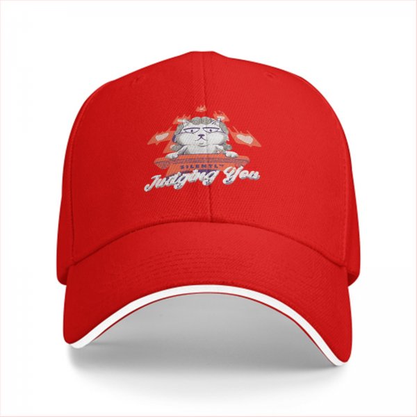 Black baseball cap with cat judge graphic and 'Silently Judging You' text