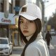Black baseball cap with 'Caution May Bite Before Caffeine' graphic