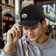 Black baseball cap with vintage cartoon character graphic
