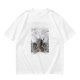 Olive green graphic t-shirt with symmetrical dark and orange artwork