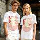 Olive t-shirt with a cartoon dinosaur in a ramen bowl graphic