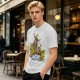 Olive T-shirt with fantasy characters balancing on a log over a stream