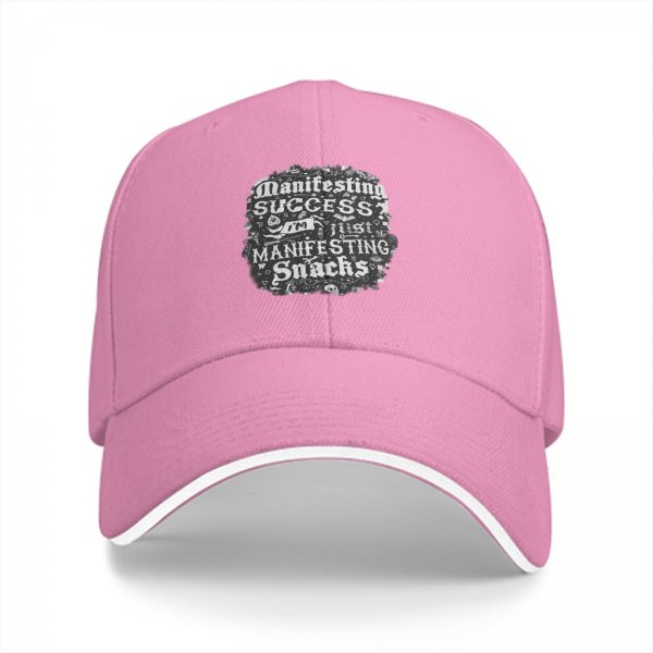 Black baseball cap with 'I'm manifesting snacks' text print