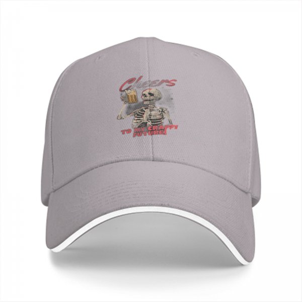 Black baseball cap with skeleton toasting beer and 'Cheers to my crappy future' text