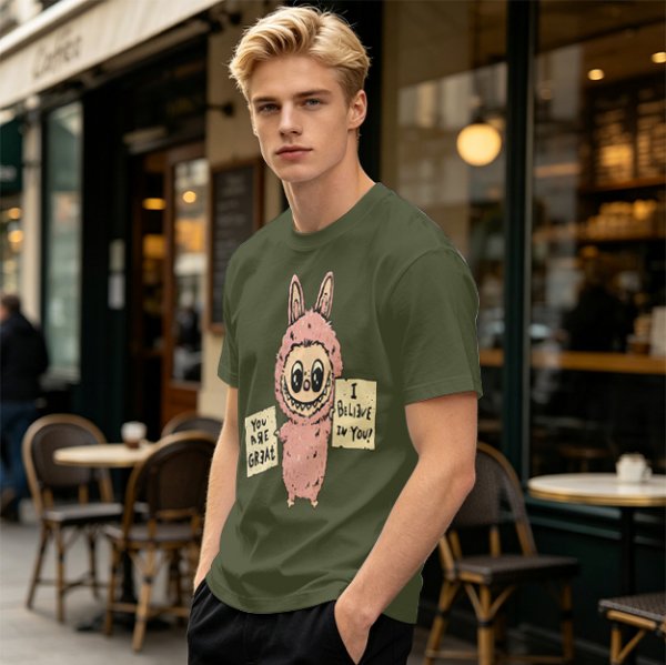 Olive T-shirt with a cute bunny monster holding You Are Great and I Believe In You signs