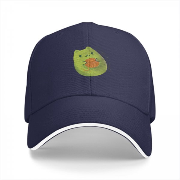 Black baseball cap with cute green cat holding orange yarn ball