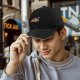 Black Baseball Cap with Sleeping Sloth Workout Graphic