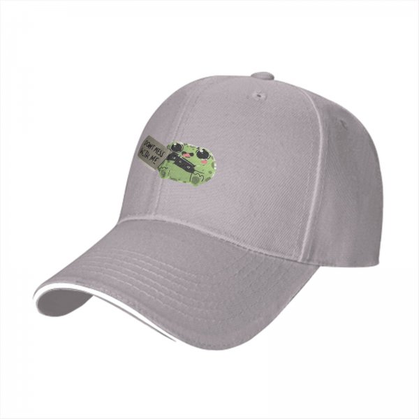 Black baseball cap with cute frog holding 'Don't mess with me' sign