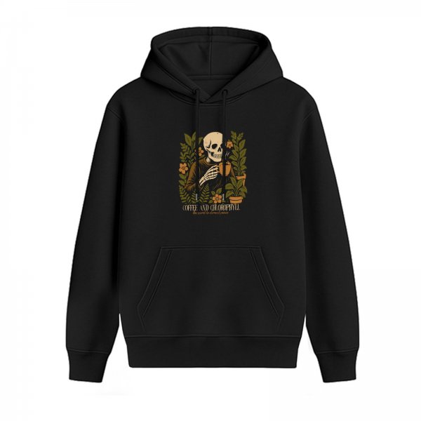 Black hoodie with skeleton holding coffee surrounded by plants