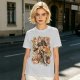 Olive green anime graphic t-shirt with monster and city scene