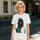 Olive T-shirt with cartoon dinosaur in Darth Vader helmet and chicken print