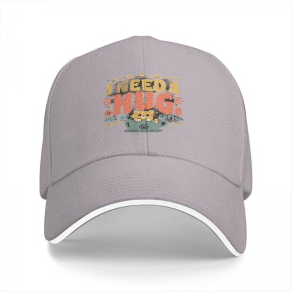 Black baseball cap with 'I need a huge cup of coffee' and cat graphic