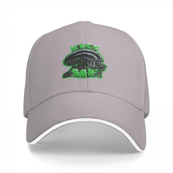 Black baseball cap with alien graphic and 'Kiss Me' text