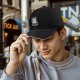 Black baseball cap with 'I Exist Without My Consent' grumpy cat print