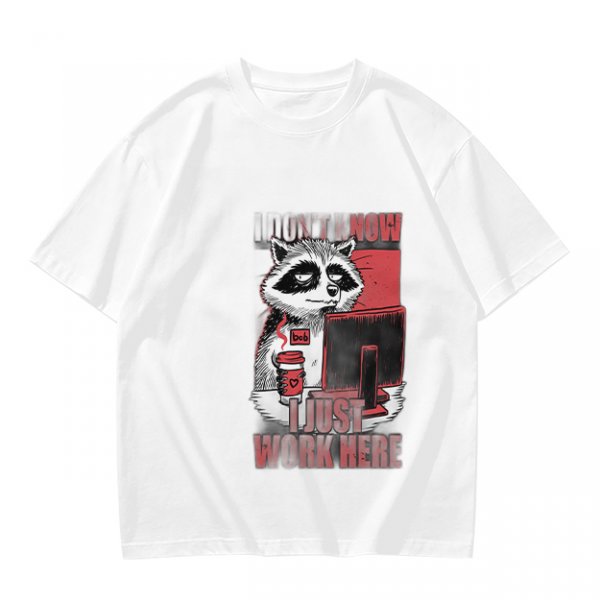 Olive graphic t-shirt with a tired raccoon office worker and 'I Just Work Here' text