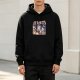 Black hoodie with retro cartoon animal skateboarding graphic
