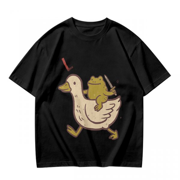 Olive T-Shirt Featuring Frog Riding Duck Holding Knife