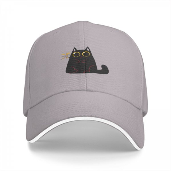 Black baseball cap with surprised cartoon black cat graphic