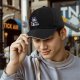 Black baseball cap with glitch-style Maleficent graphic print