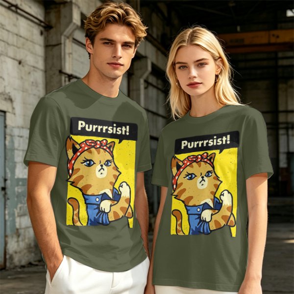 Olive green t-shirt with a cat in a Rosie the Riveter pose and 'Purrrsist!' text