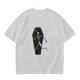 Olive t-shirt with skeleton running from starry coffin graphic