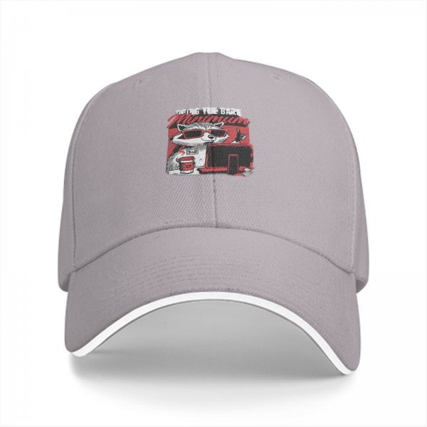 Black baseball cap with raccoon graphic doing the bare minimum