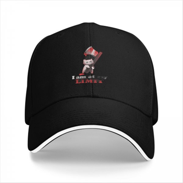 Black baseball cap with 'I am at my LIMIT' and cartoon character print