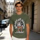 Olive graphic t-shirt with 'Enjoy the grind Assholes' coffee grinder mascot print
