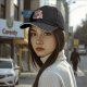 Black baseball cap with cute strawberry milk carton cat graphic