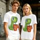 Olive green t-shirt with cute Tea Rex dinosaur holding a steaming tea mug