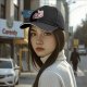 Black baseball cap with Kitty Cat graphic and text